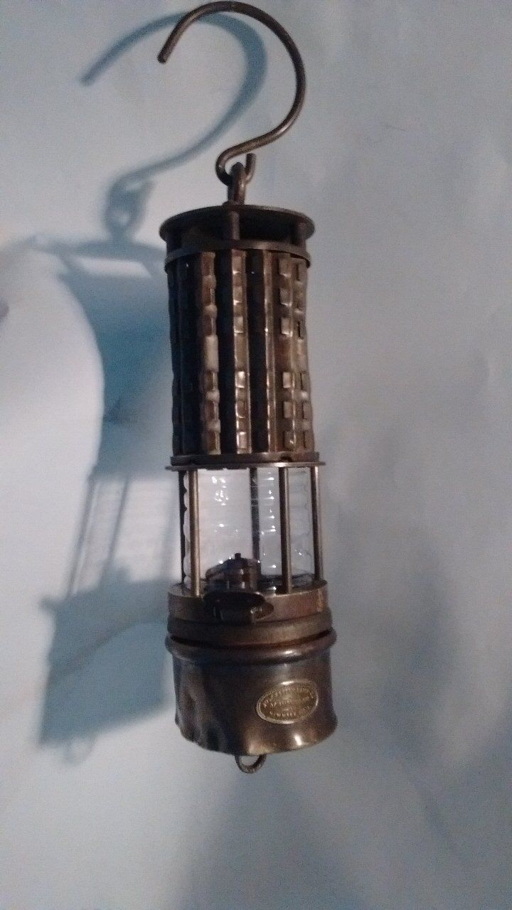 The Wolf Safety Lamp, a miner's lamp that prevented explosions in mines. It won awards for scientific innovation in 1901 in France.