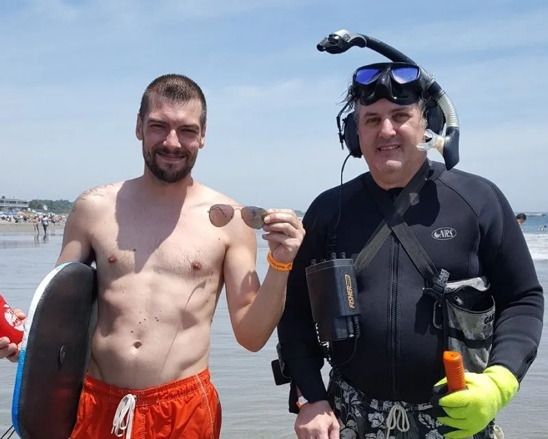 THIS GUY DOVE IN NEAR ME AND BOOGIE BOARDED IN - AS HE STOOD UP HE SAID "HOW'S IT GOING?" THEN HE REALIZED HE LOST HIS SUNGLASSES - I QUICKLY FOUND TH