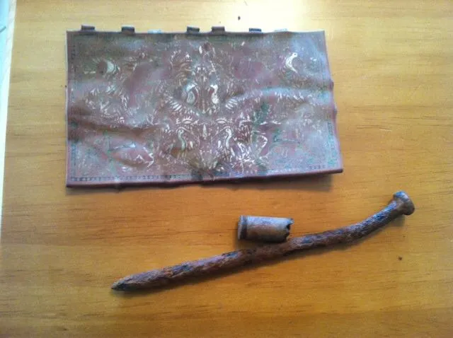 Tin box lid found on farmland in Statesville NC