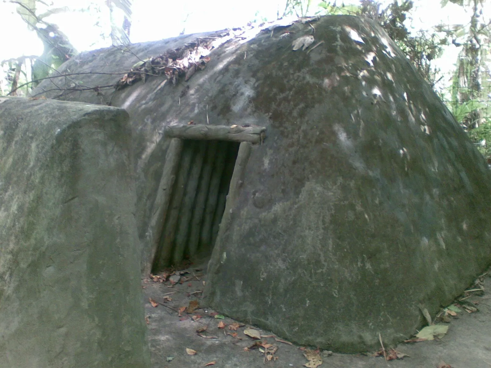 VC bomb shelter.
Note the blast wall on the left.