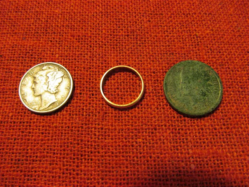 Very tiny gold ring.