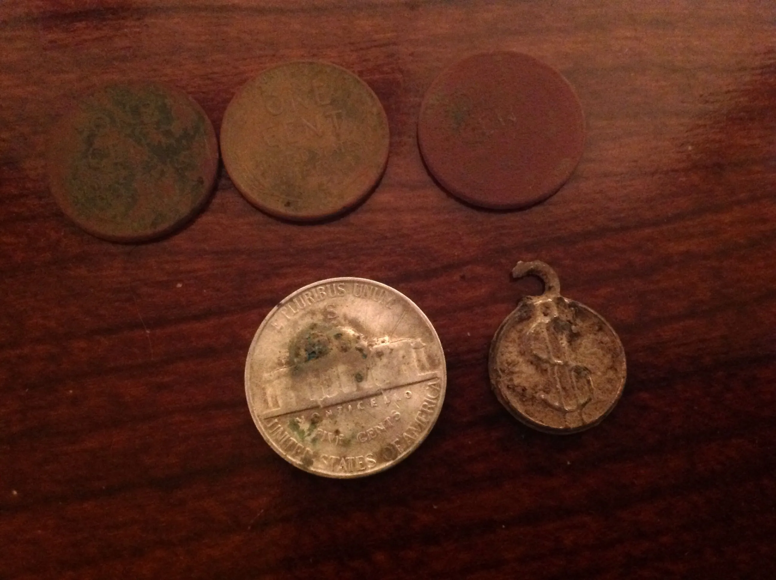 Wheats with the 1944-s war nickel and a tiny dollar sign pendant (junk)