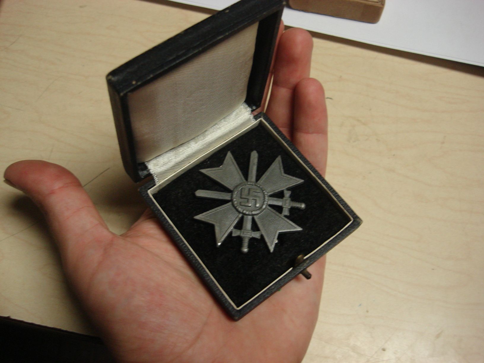WWII German First Class Merit Cross in original box.
Found Oct. 8 2014