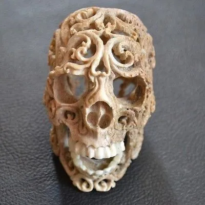 Head-Skull-Carved-In-Buffalo-Bone-Fossil.jpg